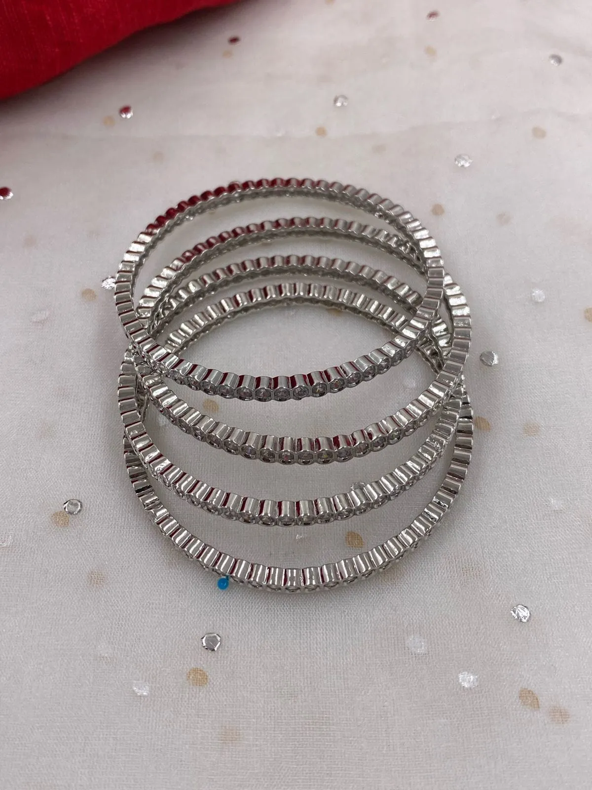 American Diamond Studded Silver Rhodium Plated CZ Bangles (Set Of 4)