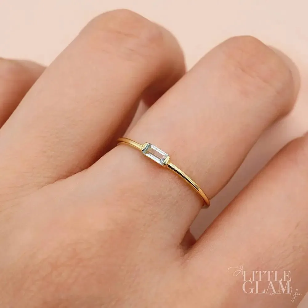 Delicate Baguette Blue Topaz Ring