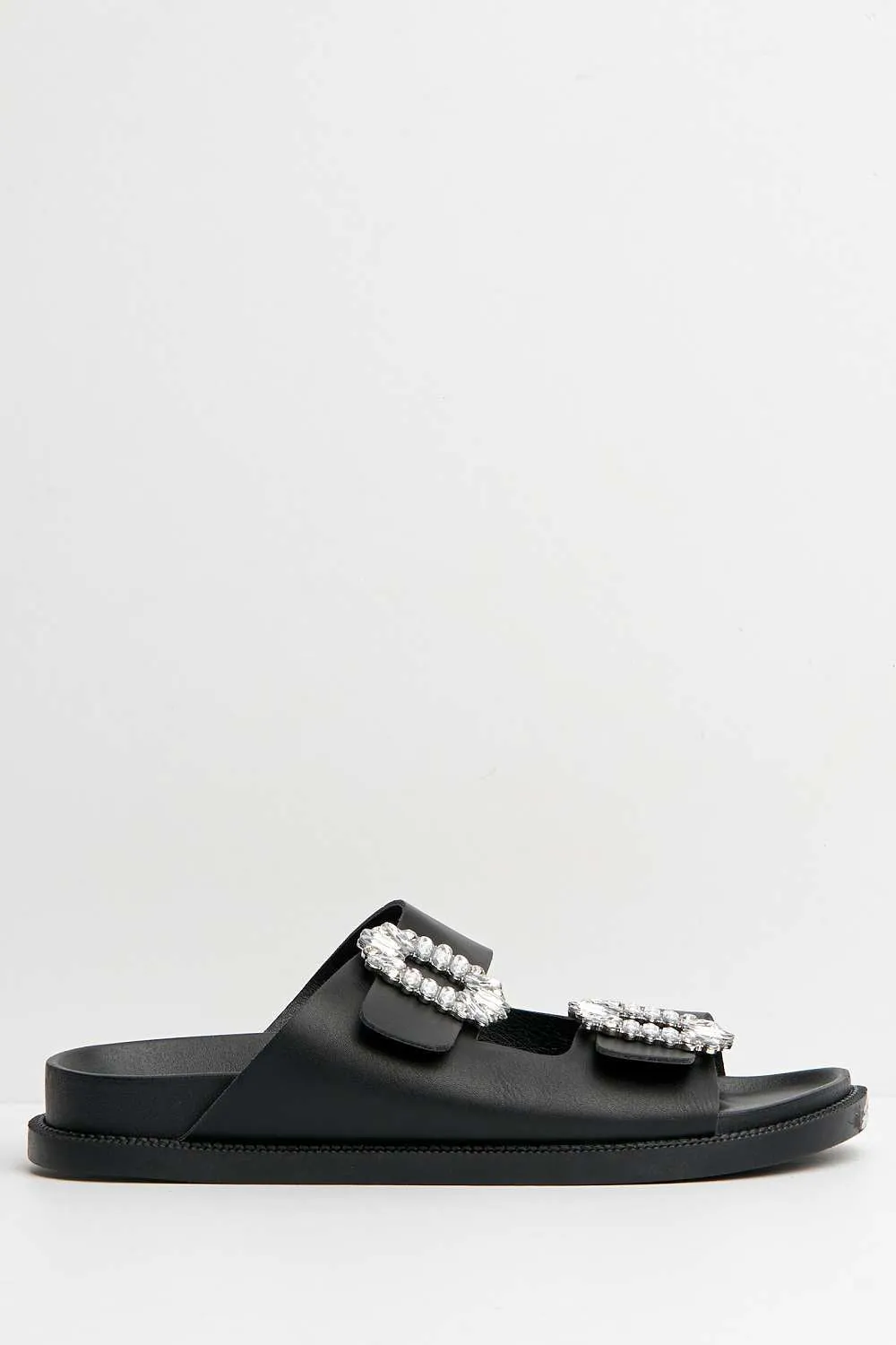 Kora Diamante Brooch Detail Flat Sandals in Black